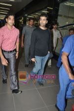 Karan Johar spotted at Mumbai International Airport on 27th May 2010 (5).JPG